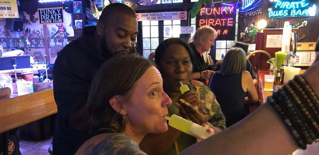 The Funky Pirate Blues Club with patrons drinking quirky shots