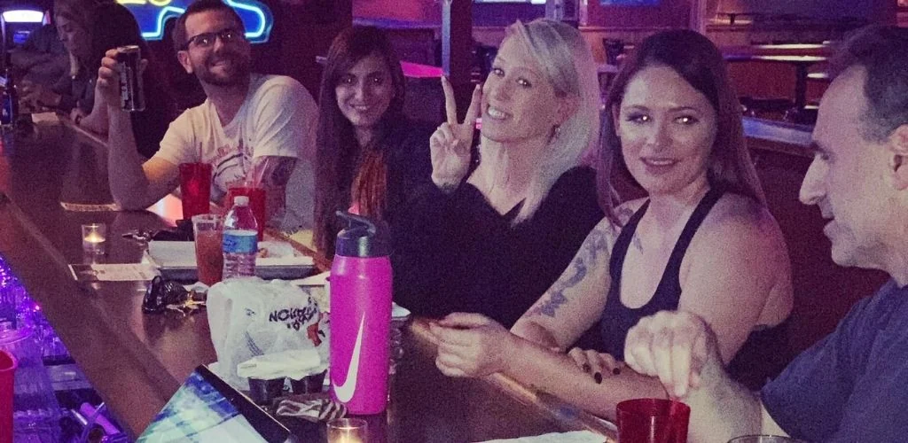 Tucson cougars drinking at the bar in The Maverick King of Clubs