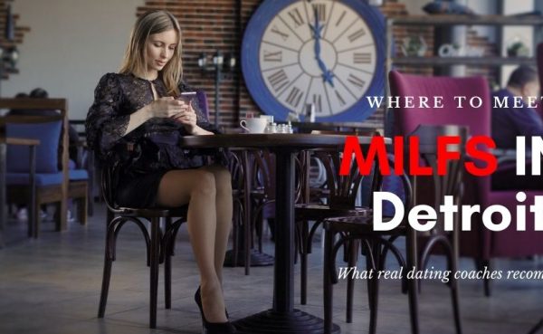Single Detroit MILF sitting at a table texting