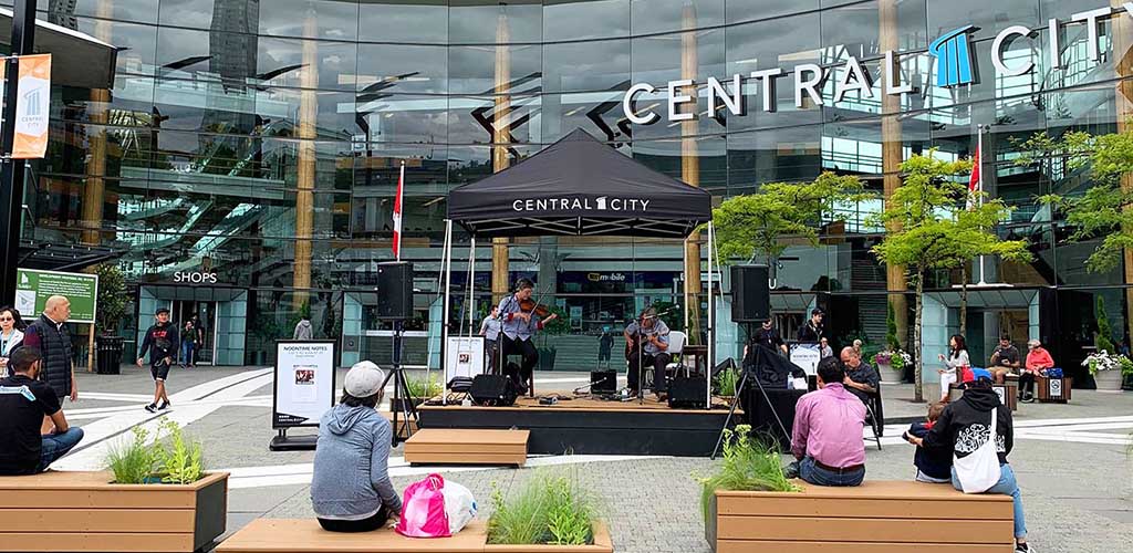 A live performance in front of Central City Shopping Center