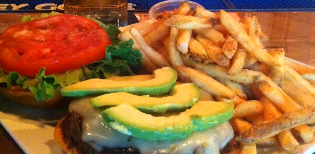 An avocado burger and fries from Magooby's