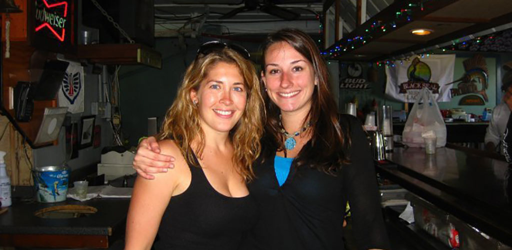 Beautiful women at the bar in Salty Mike's with a laidback lady
