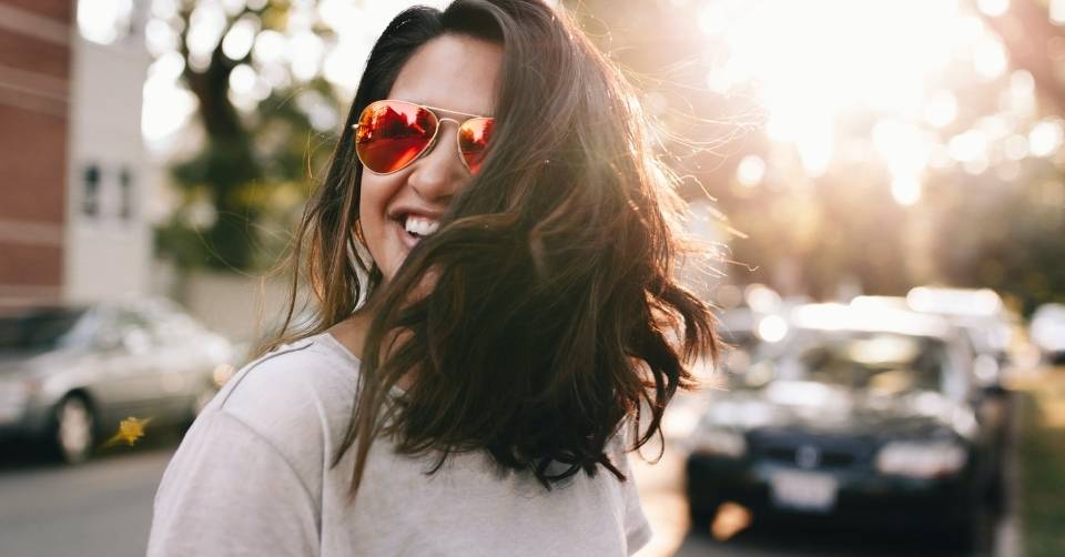 A woman wearing cool sunglasses