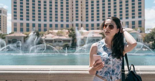 A woman using a Las Vegas dating app to meet someone new