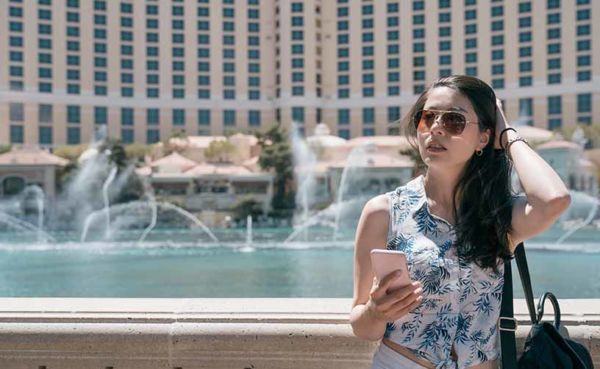 A woman using a Las Vegas dating app to meet someone new