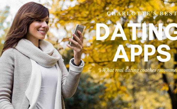 Woman checking out the best dating apps in Charlotte while in a park in autumn