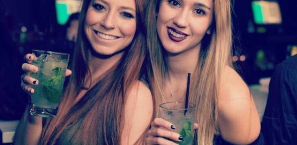 Two girls drinking at Chrome Nightclub