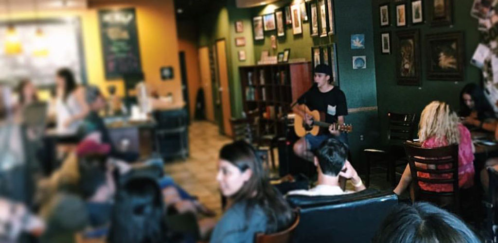 A crowd enjoying coffee, music, and looking for local hookups at Daily Brew Coffee House 