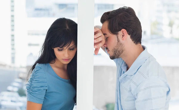 sad couple wondering how to know when their relationship is over