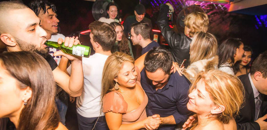 Singles drinking, dancing and hooking up at the dance floor of Eclipse in London