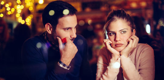 Man struggling with how to understand a woman while on a date