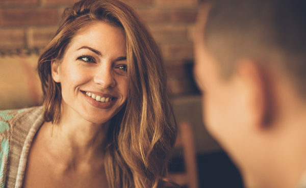 couple flirting after discovering what attracts women to men