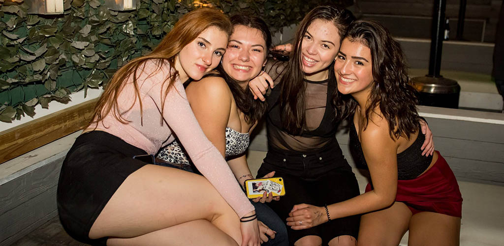 Gorgeous single women seeking men in San Antonio on a night out at Lush Rooftop
