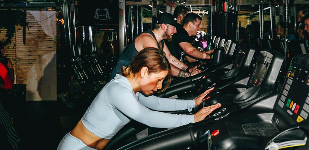 Fitness buffs on the elliptical machines at Everybody Fights