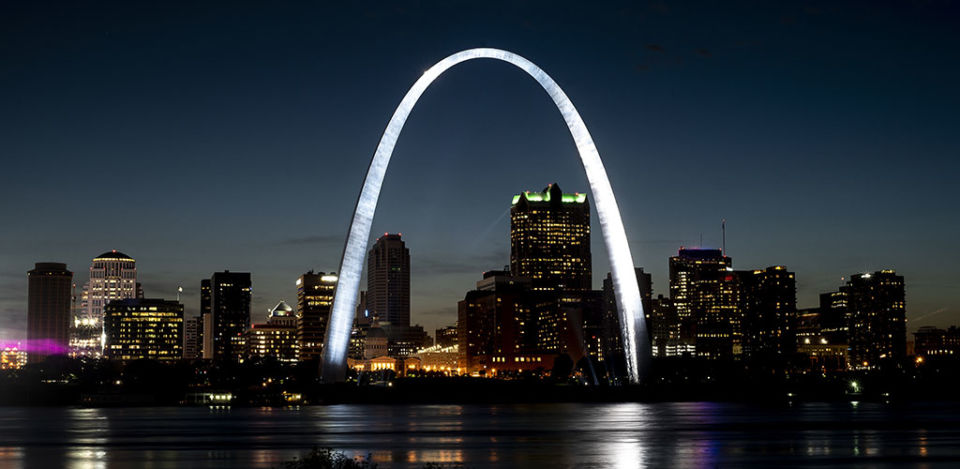 St Louis Gateway Arch brightly lit and shining at night