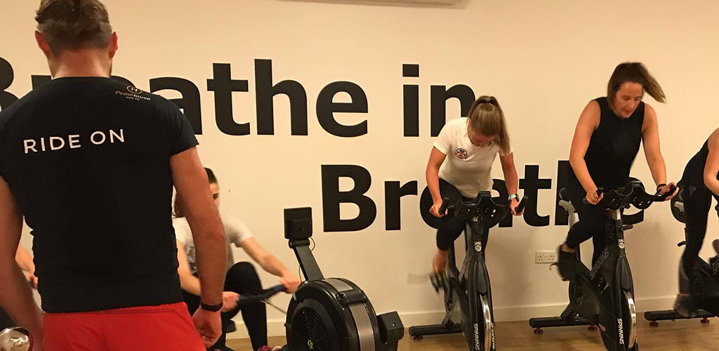 A bike and row class at Pedal House