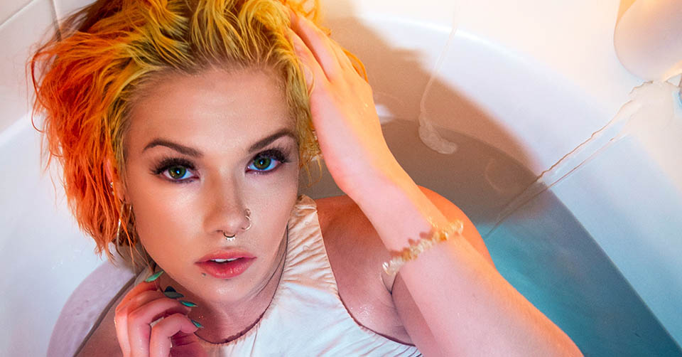 Sexy blonde woman in a bathtub