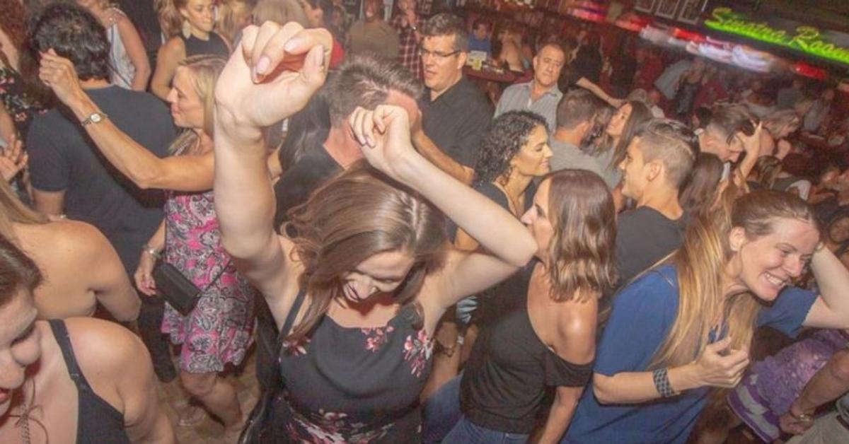 Lots of people dancing in an Atlanta cougar bar