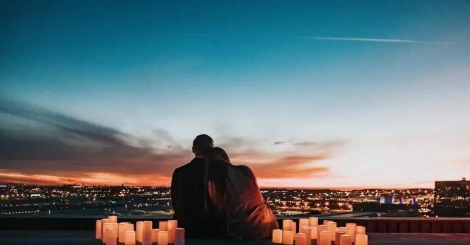 Romantic sunset with a couple in love