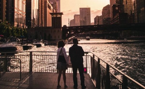 Couple on a date night in Chicago by the river walk