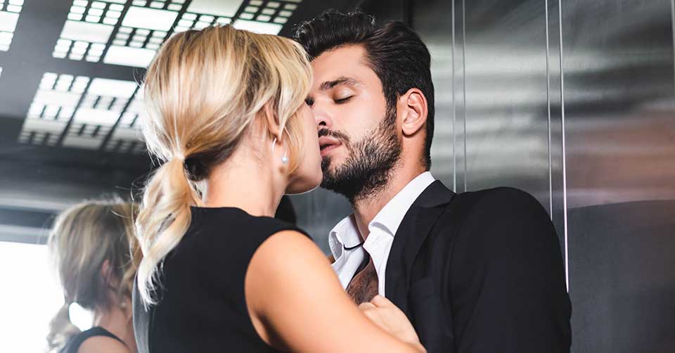Kissing in the office elevator