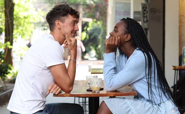 Couple dating in Dallas at a coffee shop