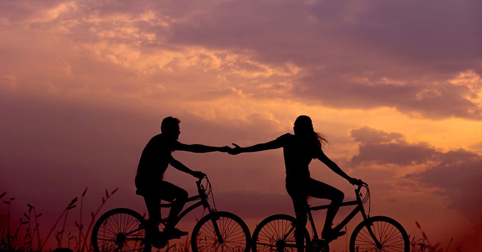 Shaking hands on a bike date