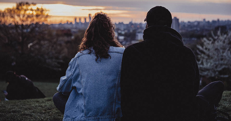 A couple looking over the city