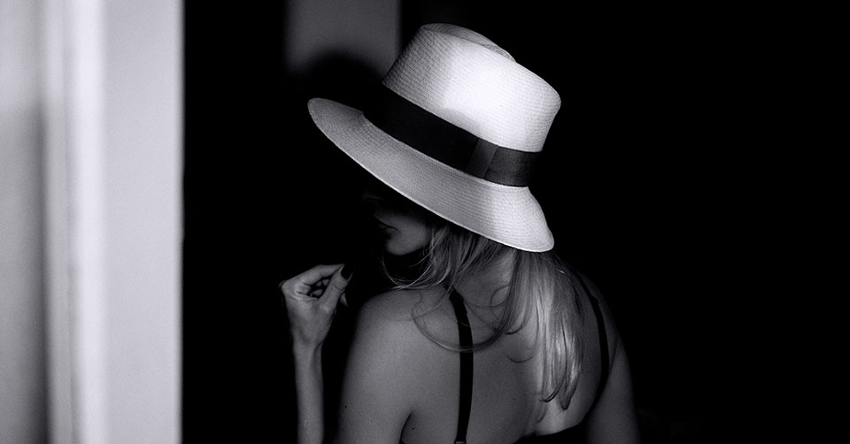 A mysterious woman in a hat