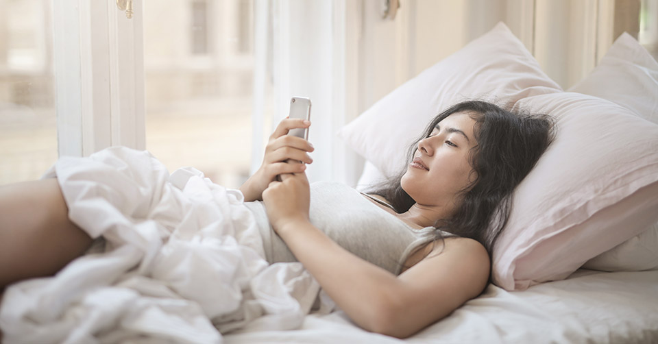 Using a new dating app in bed