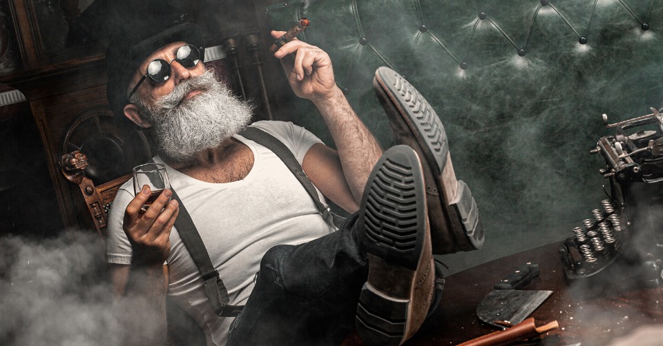 A high-testosterone man smoking a cigar