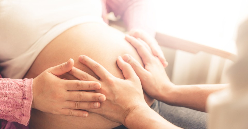 Pregnancy is one reason some couples choose to move in