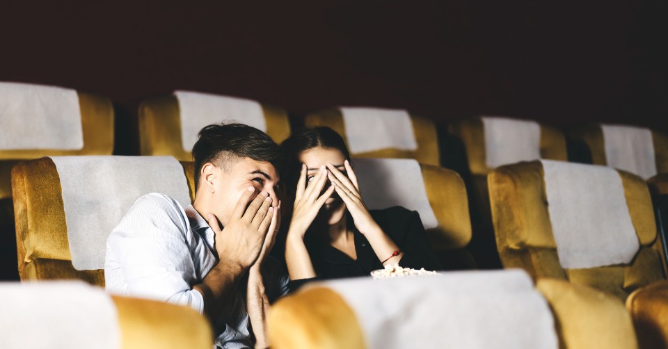Watching a scary movie to increase attraction