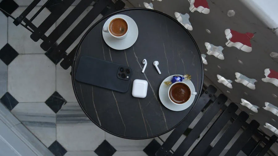 Two coffees on a small town café table ready for a first date